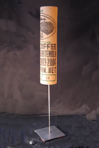 Floor lamp made of coffee bags which are decorated with interesting markings. Great light on its own and gorgeous next to your favorite chair.
